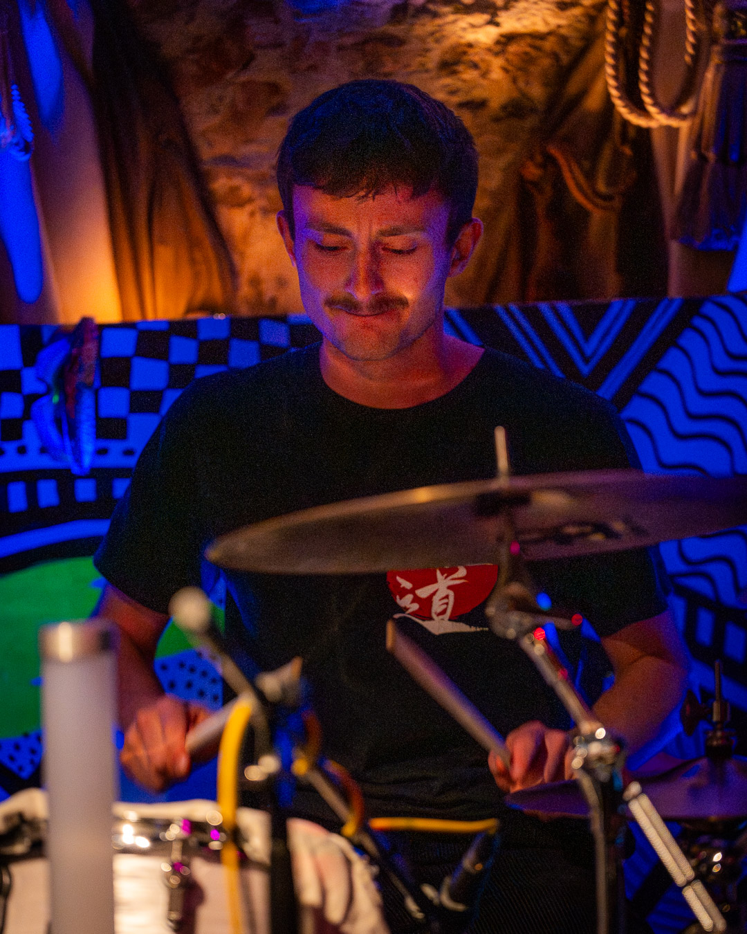 Philipp Volgger playing drums on stage